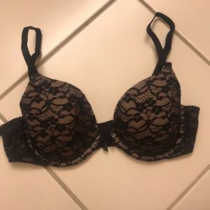 Cute black Lacey bra with nude background